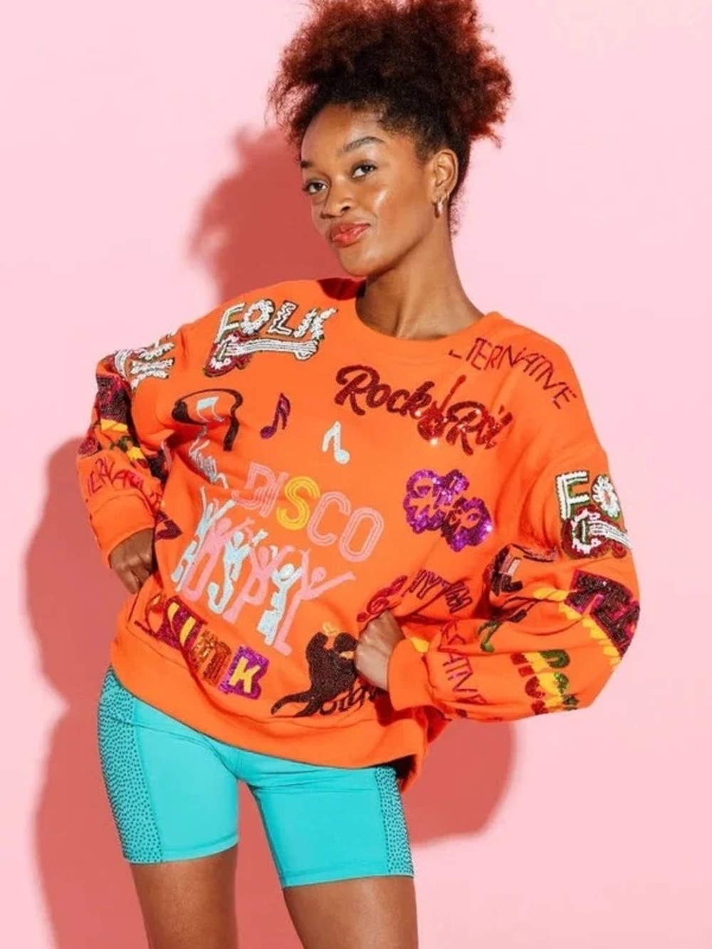 Queen of Sparkles Orange Music Sweatshirt.